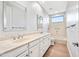 Spacious bathroom with double sinks, vanity and neutral tile and finishes at 1724 W Blue Ridge Way, Chandler, AZ 85248
