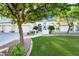 Charming home with meticulously manicured lawn, desert landscaping, and a two-car garage at 1724 W Blue Ridge Way, Chandler, AZ 85248