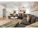 Open-concept living space with a comfortable sectional sofa and seamless flow to the dining area at 1800 W Shawnee Dr, Chandler, AZ 85224