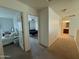 Hallway featuring 3 rooms: one bathroom, and two bedrooms at 18514 W Williams Rd, Surprise, AZ 85387