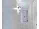 Bright hallway with neutral paint, tile flooring, and recessed lighting at 2030 E Alder Cir, Mesa, AZ 85204