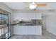 Bright kitchen featuring granite countertops, stainless appliances and tile flooring at 2030 E Alder Cir, Mesa, AZ 85204