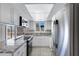 Bright kitchen featuring granite countertops and stainless steel appliances at 2030 E Alder Cir, Mesa, AZ 85204