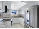 Bright kitchen featuring granite countertops and stainless steel appliances at 2030 E Alder Cir, Mesa, AZ 85204