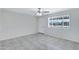 Bright living room featuring tile flooring and a ceiling fan at 2030 E Alder Cir, Mesa, AZ 85204