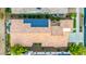Aerial view of the home showing tile roof, backyard patio, and solar panels at 20784 W Minnezona Ave, Buckeye, AZ 85396