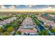 Expansive aerial view of a well-designed community with tree-lined streets at 20784 W Minnezona Ave, Buckeye, AZ 85396