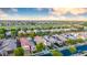 Panoramic aerial view showcasing the neighborhood's well-manicured streets and lush greenery at 20784 W Minnezona Ave, Buckeye, AZ 85396