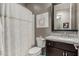 Classic bathroom showcasing a vanity, toilet, and shower with neutral accents at 20784 W Minnezona Ave, Buckeye, AZ 85396