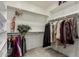 Walk-in closet with ample storage space, shelving, and hanging racks at 20784 W Minnezona Ave, Buckeye, AZ 85396