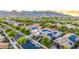 Picturesque neighborhood with houses that have solar panels and a beautiful mountain backdrop at 20784 W Minnezona Ave, Buckeye, AZ 85396