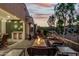 Outdoor patio featuring a fire pit with comfortable seating, perfect for enjoying evenings at 20784 W Minnezona Ave, Buckeye, AZ 85396