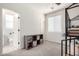 Bedroom featuring a bunkbed and a bathroom with a toilet at 2562 N Springfield St, Buckeye, AZ 85396