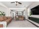 Comfortable living room with two sofas, ceiling fan, and open floor plan provides a welcoming space at 2562 N Springfield St, Buckeye, AZ 85396