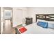 Bright bedroom features a neutral color palette and a double door closet at 25787 W Allen St, Buckeye, AZ 85326