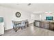 Bright dining area featuring stylish chairs and modern lighting near the kitchen at 25787 W Allen St, Buckeye, AZ 85326