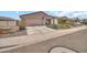 Cozy single-Gathering home featuring a spacious driveway and low-maintenance landscaping at 25787 W Allen St, Buckeye, AZ 85326