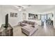 Spacious living area seamlessly connecting the living room, kitchen, and dining space at 25787 W Allen St, Buckeye, AZ 85326