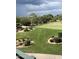 Scenic golf course view showcasing lush green fairways and manicured landscaping at 27000 N Alma School Pkwy # 1033, Scottsdale, AZ 85262