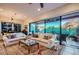 Living room with comfortable seating, stylish decor, and expansive views of the surrounding landscape at 27000 N Alma School Pkwy # 1033, Scottsdale, AZ 85262