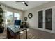 Modern home office with a contemporary desk, stylish decor, and plenty of natural light at 27647 N 176Th Dr, Surprise, AZ 85387