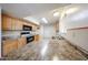 Functional kitchen featuring ample counter space, classic cabinets, and modern appliances for everyday cooking at 2933 W Del Mar Ln, Phoenix, AZ 85053