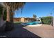 Inviting backyard with a refreshing pool and mature landscaping, perfect for outdoor enjoyment at 2933 W Del Mar Ln, Phoenix, AZ 85053