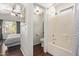 En-suite bathroom boasts a walk-in shower and tub, seamlessly connected to the main bedroom at 3222 E Cortez St, Phoenix, AZ 85028