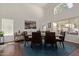 Open dining room with lots of natural light, high ceilings, modern decor, and wood laminate flooring at 3222 E Cortez St, Phoenix, AZ 85028