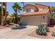 Two-story home featuring a tile roof, desert landscaping and a two car garage at 3222 E Cortez St, Phoenix, AZ 85028