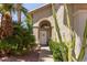 Home featuring desert landscaping, a tile roof and a charming front porch at 3222 E Cortez St, Phoenix, AZ 85028