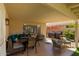 Inviting covered patio with comfortable seating and shade, designed for outdoor enjoyment and relaxation at 3222 E Cortez St, Phoenix, AZ 85028