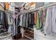 Organized walk-in closet with clothing racks and shelves for shoes and accessories offering plenty of storage at 3222 E Cortez St, Phoenix, AZ 85028