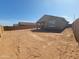 An expansive backyard showing a blank canvas with a block fence at 329 S San Christo Ln, Casa Grande, AZ 85194