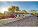 Sky Crossing community entrance sign and flower bed, with trees and landscape at 3417 E Los Gatos Dr, Phoenix, AZ 85050