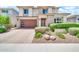 Attractive home featuring low maintenance landscaping, a two-car garage, and a welcoming front entrance at 3417 E Los Gatos Dr, Phoenix, AZ 85050