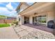 Outdoor living area offering a covered patio and desert landscaping at 3417 E Los Gatos Dr, Phoenix, AZ 85050