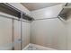 A walk-in closet features shelving with tile flooring at 3512 S Elm St, Tempe, AZ 85282
