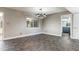 Inviting dining room with tile floors, modern lighting fixture, and a view into the kitchen at 3512 S Elm St, Tempe, AZ 85282
