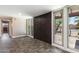 Inviting entryway featuring a double door entry, tiled flooring, and natural light from surrounding windows at 3512 S Elm St, Tempe, AZ 85282