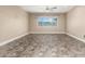 Bright living room featuring tile flooring, a ceiling fan, neutral paint, and a large window at 3512 S Elm St, Tempe, AZ 85282