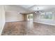 Spacious living room with tiled floors, a ceiling fan, and natural light, perfect for entertaining at 3512 S Elm St, Tempe, AZ 85282