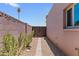 Side yard featuring landscaping and a gate at 3512 S Elm St, Tempe, AZ 85282