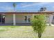 Expansive backyard featuring solar panels and covered patio at 3519 W Libby St, Glendale, AZ 85308