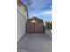 Long driveway leading to backyard shed at 3519 W Libby St, Glendale, AZ 85308