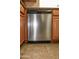 Built-in stainless steel dishwasher with oak cabinets at 3519 W Libby St, Glendale, AZ 85308