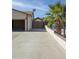 Long driveway leading to backyard shed at 3519 W Libby St, Glendale, AZ 85308