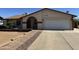 View of a single-story house with a well-kept yard and paved walkway at 3519 W Libby St, Glendale, AZ 85308