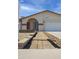 Well-maintained front yard and walkway lead to the entrance of this inviting single-story home at 3519 W Libby St, Glendale, AZ 85308