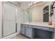 Clean bathroom featuring tiled floor, a shower, and vanity with storage at 3742 E Sandy Way, Gilbert, AZ 85297